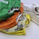 BLEIEPAKKE/STARTPAKKE: 4 stk cover/sperrelag SMALL/one size m/12 innlegg tøybleier thumbnail